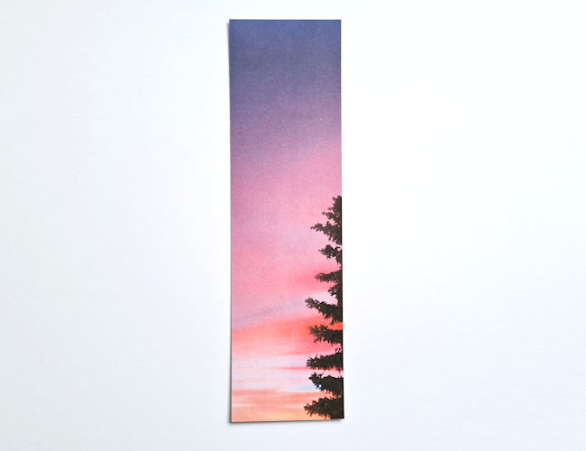 sunset with a conifer tree, blended photography bookmark